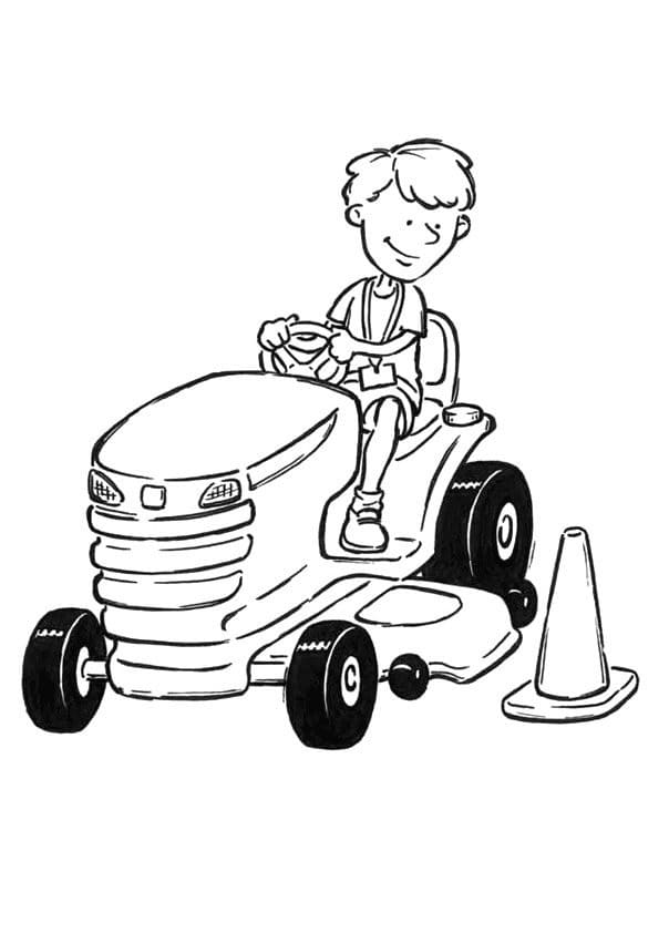 Un băiat fericit conduce un tractor